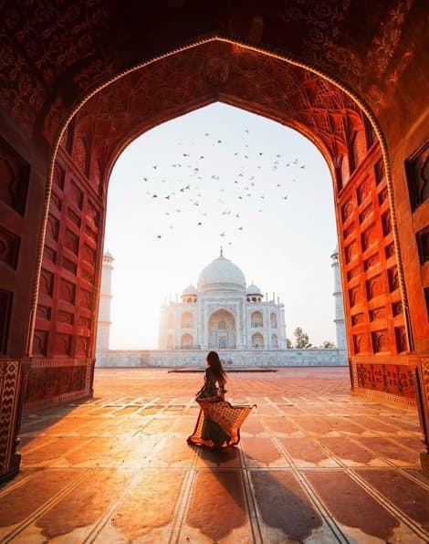 A traveler experiencing the Taj Mahal with Grand Indian Tours